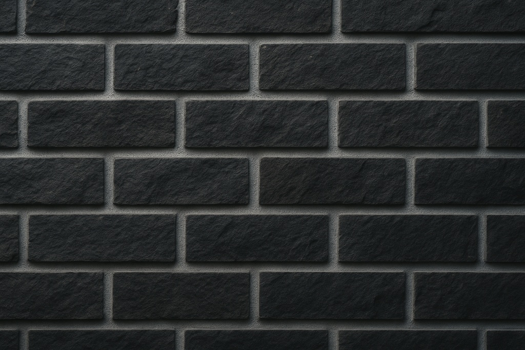 Dunkle Klinkerfassade mit präzisen Fugen – professionelle Fassadenfugen vom Fugenbetrieb Sundarp in Eschweiler.